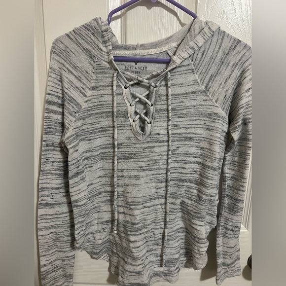 Soft and sexy shirt! XS (us) but fits bigger. - Picture 1 of 3